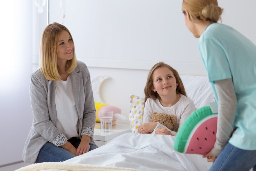 Mother and daughter in a hospital